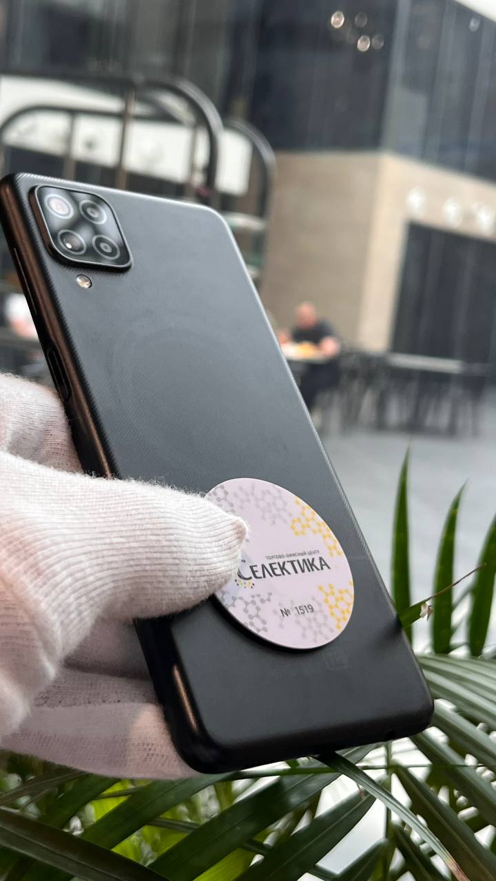 NFC-метка RFID с номером на задней крышке телефона NFC-метка с печатью номера на задней крышке телефона. Чип MIFARE 1k, феррошитовый слой для металлических чехлов.